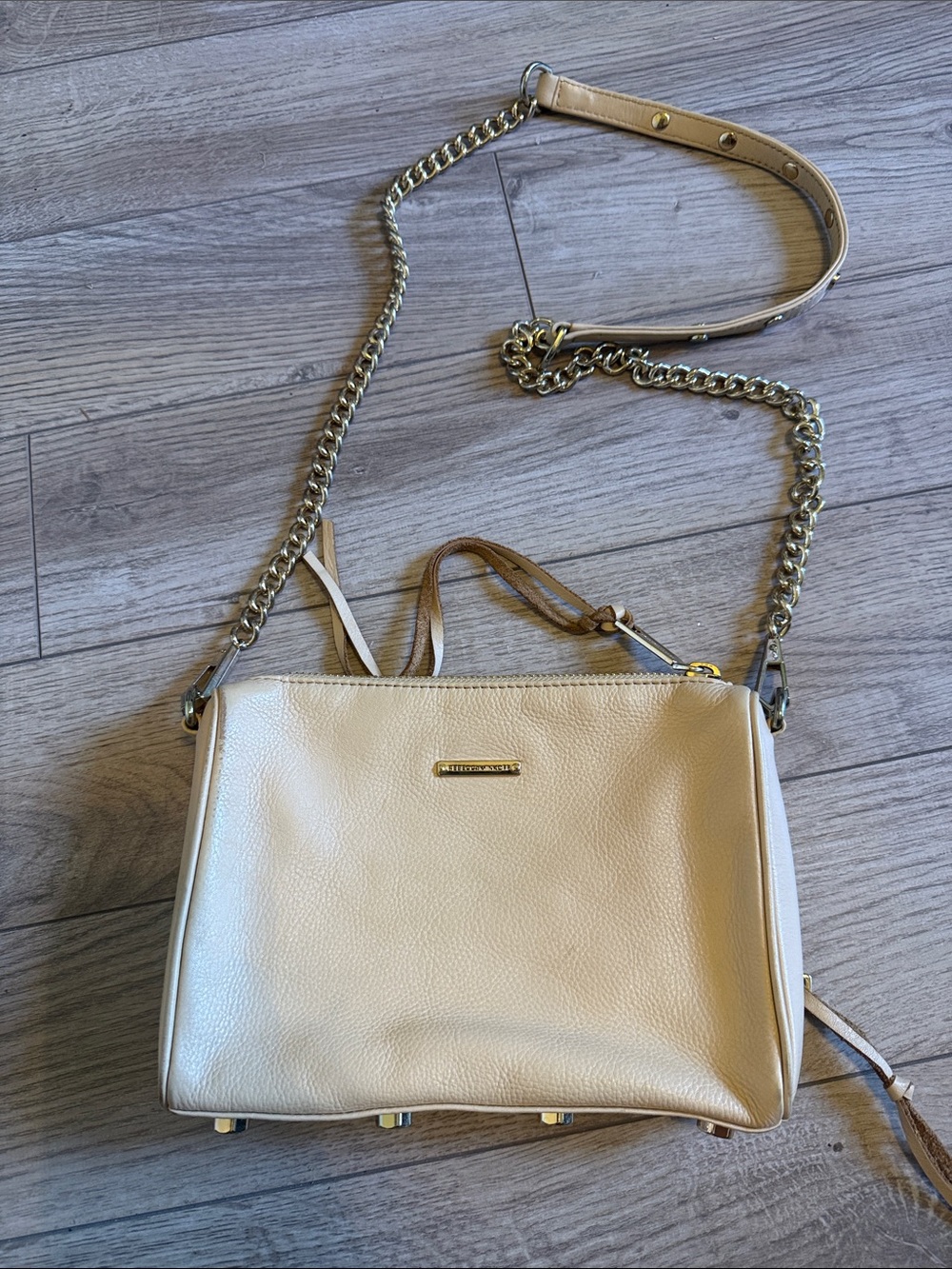 Rebecca Minkoff tan and gold moto zip crossbody chain bag
